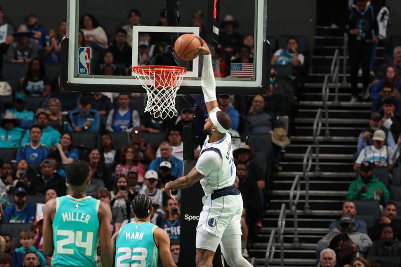 CHARLOTTE, NC - APRIL 9: Daniel Gafford #21 of the Dallas Mavericks dunks the ball during the game against the Charlotte Hornets on April 9, 2024 at Spectrum Center in Charlotte, North Carolina. NOTE TO USER: User expressly acknowledges and agrees that, by downloading and or using this photograph, User is consenting to the terms and conditions of the Getty Images License Agreement. Mandatory Copyright Notice: Copyright 2024 NBAE (Photo by Kent Smith/NBAE via Getty Images)