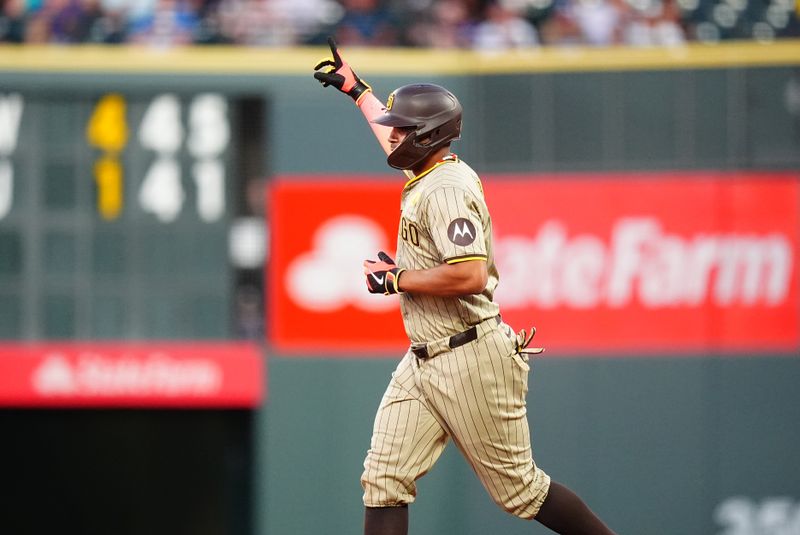 Aug 16, 2024; Denver, Colorado, USA; San Diego Padres second base Xander Bogaerts (2) celebrates his solo home run in the fourth inning against the Colorado Rockies at Coors Field. Mandatory Credit: Ron Chenoy-USA TODAY Sports