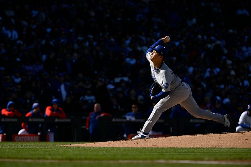 Apr 6, 2024; Chicago, Illinois, USA;  Los Angeles Dodgers pitcher Yoshinobu Yamamoto (18) delivers against the Chicago Cubs during the first inning at Wrigley Field. Mandatory Credit: Matt Marton-USA TODAY Sports