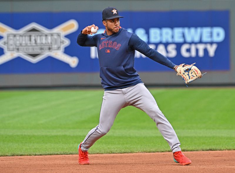 Apr 25, 2025; Kansas City, Missouri, USA;  Houston Astros shortstop Jeremy Pena (3) throws during batting practice before a game against the Kansas City Royals at Kauffman Stadium. Mandatory Credit: Peter Aiken-Imagn Images
