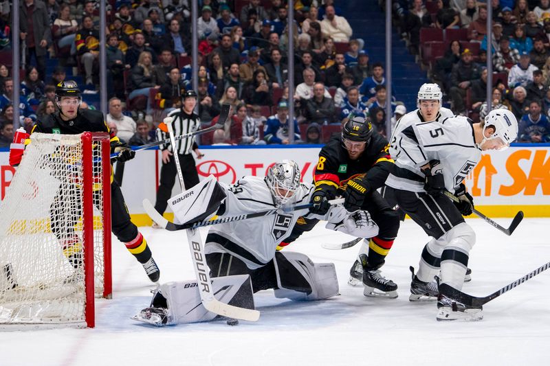 Mar 25, 2024; Vancouver, British Columbia, CAN;  Vancouver Canucks forward Sam Lafferty (18) battles for the rebound with Los Angeles Kings defenseman Andreas Englund (5) and goalie Cam Talbot (39) in the third period at Rogers Arena. Kings won 3 -2. Mandatory Credit: Bob Frid-USA TODAY Sports