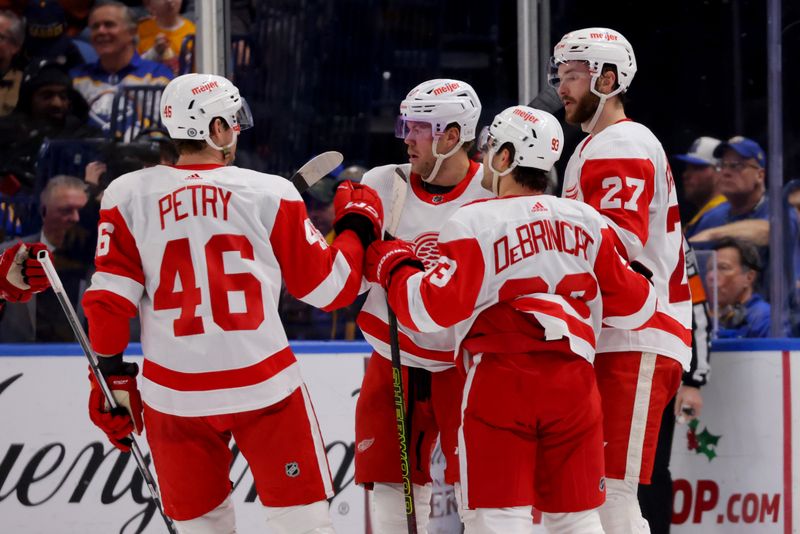 Dec 5, 2023; Buffalo, New York, USA;  Detroit Red Wings center Michael Rasmussen (27) celebrates his goal with teammates during the second period against the Buffalo Sabres at KeyBank Center. Mandatory Credit: Timothy T. Ludwig-USA TODAY Sports