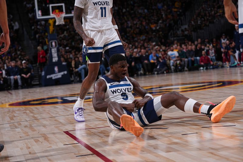 DENVER, CO - APRIL 10: Anthony Edwards #5 of the Minnesota Timberwolves celebrates during the game against the Denver Nuggets on April 10, 2024 at the Ball Arena in Denver, Colorado. NOTE TO USER: User expressly acknowledges and agrees that, by downloading and/or using this Photograph, user is consenting to the terms and conditions of the Getty Images License Agreement. Mandatory Copyright Notice: Copyright 2024 NBAE (Photo by Bart Young/NBAE via Getty Images)