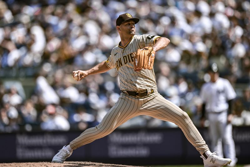 May 27, 2023; Bronx, New York, USA; San Diego Padres starting pitcher Nick Martinez (21) pitches during the eighth inning against the New York Yankees at Yankee Stadium. Mandatory Credit: John Jones-USA TODAY Sports