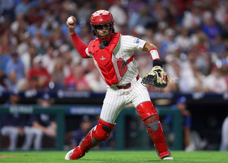 Sep 11, 2024; Philadelphia, Pennsylvania, USA; Philadelphia Phillies catcher Aramis Garcia (41) throws to first base for an out against the Tampa Bay Rays during the fourth inning at Citizens Bank Park. Mandatory Credit: Bill Streicher-Imagn Images