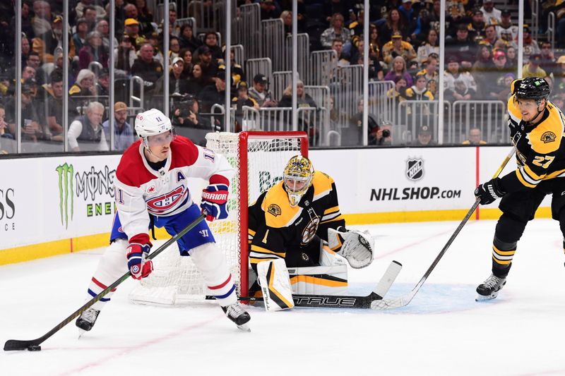 Oct 10, 2024; Boston, Massachusetts, USA; Montreal Canadiens right wing Brendan Gallagher (11) controls the puck in front of Boston Bruins goaltender Jeremy Swayman (1) during the second period at TD Garden. Mandatory Credit: Bob DeChiara-Imagn Images