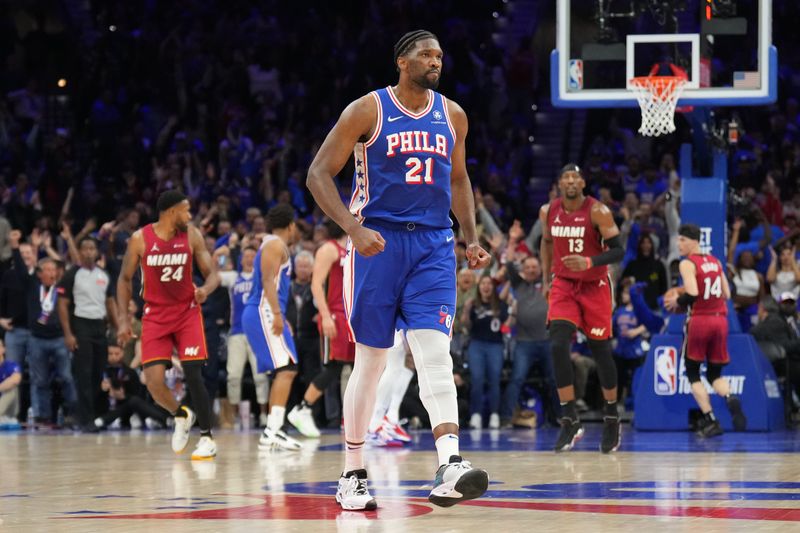 PHILADELPHIA, PA - APRIL 17: Joel Embiid #21 of the Philadelphia 76ers celebrates during the game against the Miami Heat during the 2024 NBA Play-In Tournament on April 17, 2024 at the Wells Fargo Center in Philadelphia, Pennsylvania NOTE TO USER: User expressly acknowledges and agrees that, by downloading and/or using this Photograph, user is consenting to the terms and conditions of the Getty Images License Agreement. Mandatory Copyright Notice: Copyright 2024 NBAE (Photo by Jesse D. Garrabrant/NBAE via Getty Images)