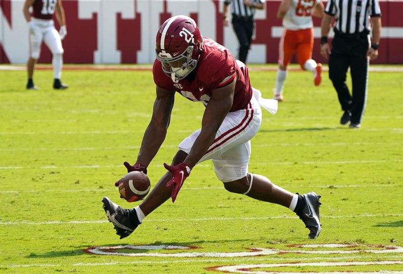 Sep 11, 2021; Tuscaloosa, Alabama, USA;  Alabama Crimson Tide running back Jase McClellan (21) scoops up a blocked punt and scores against Mercer Bears at Bryant-Denny Stadium. Mandatory Credit: Marvin Gentry-USA TODAY Sports