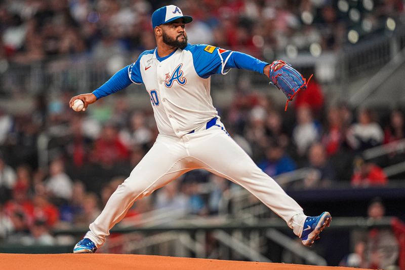 Sep 28, 2024; Cumberland, Georgia, USA; Atlanta Braves pitcher Reynaldo Lopez (40) pitches against the Kansas City Royals during the first inning at Truist Park. Mandatory Credit: Dale Zanine-Imagn Images