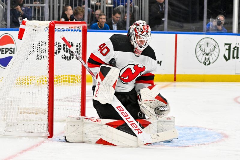 Nov 3, 2023; St. Louis, Missouri, USA;  New Jersey Devils goaltender Akira Schmid (40) defends the net against the St. Louis Blues during the second period at Enterprise Center. Mandatory Credit: Jeff Curry-USA TODAY Sports