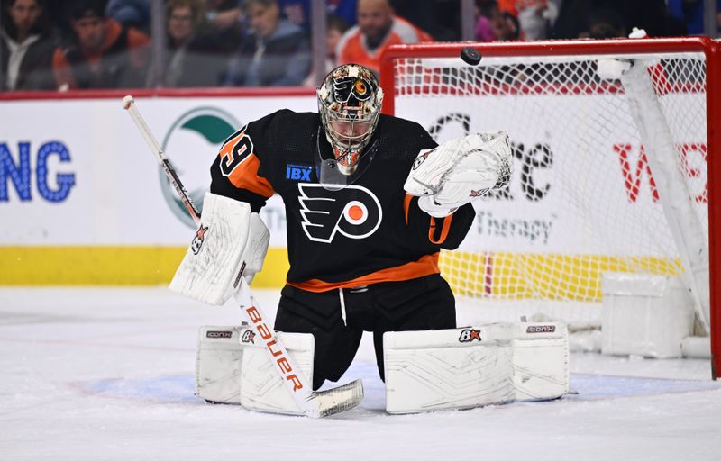 Nov 24, 2023; Philadelphia, Pennsylvania, USA; Philadelphia Flyers goalie Carter Hart (79) makes a save against the New York Rangers in the third period at Wells Fargo Center. Mandatory Credit: Kyle Ross-USA TODAY Sports