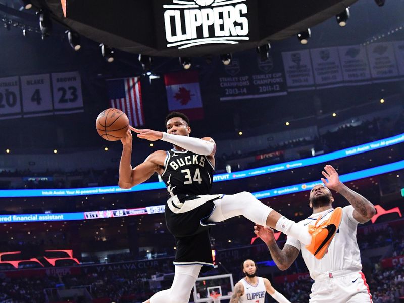 LOS ANGELES, CA - MARCH 10: Giannis Antetokounmpo #34 of the Milwaukee Bucks looks to pass the ball during the game against the LA Clippers on March 10, 2024 at Crypto.Com Arena in Los Angeles, California. NOTE TO USER: User expressly acknowledges and agrees that, by downloading and/or using this Photograph, user is consenting to the terms and conditions of the Getty Images License Agreement. Mandatory Copyright Notice: Copyright 2024 NBAE (Photo by Adam Pantozzi/NBAE via Getty Images)