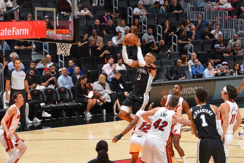 MIAMI, FL - OCTOBER 15: Keldon Johnson #0 of the San Antonio Spurs drives to the basket during the game against the Miami Heat during a NBA preseason game on October 15, 2024 at Kaseya Center in Miami, Florida. NOTE TO USER: User expressly acknowledges and agrees that, by downloading and or using this Photograph, user is consenting to the terms and conditions of the Getty Images License Agreement. Mandatory Copyright Notice: Copyright 2024 NBAE (Photo by Jesse D. Garrabrant/NBAE via Getty Images)