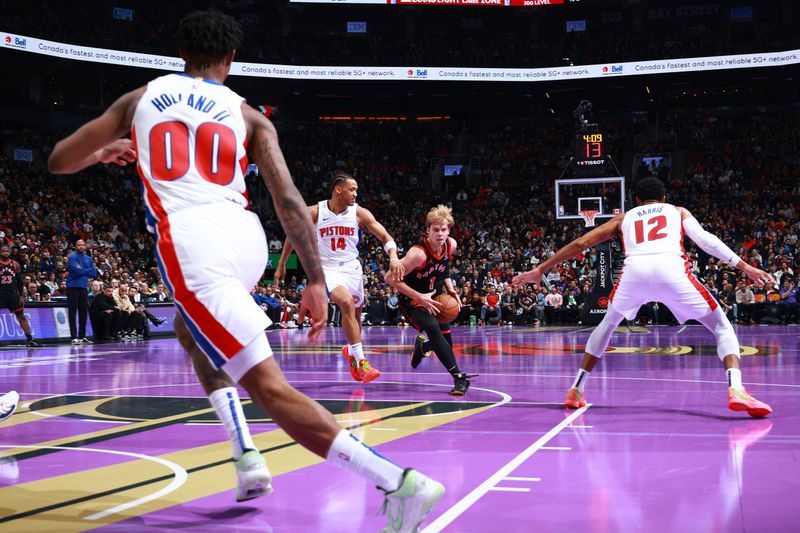 TORONTO, CANADA - NOVEMBER 15: Gradey Dick #1 of the Toronto Raptors handles the ball during the game against the Detroit Pistons during the Emirates NBA Cup game on November 15, 2024 at the Scotiabank Arena in Toronto, Ontario, Canada.  NOTE TO USER: User expressly acknowledges and agrees that, by downloading and or using this Photograph, user is consenting to the terms and conditions of the Getty Images License Agreement.  Mandatory Copyright Notice: Copyright 2024 NBAE (Photo by Vaughn Ridley/NBAE via Getty Images)