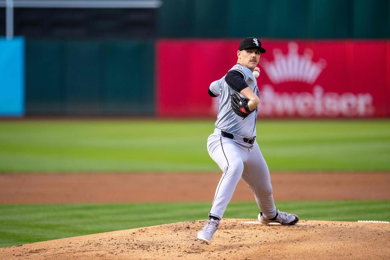 Aug 5, 2024; Oakland, California, USA;  Chicago White Sox starting pitcher Ky Bush (57) delivers a pitch against the Oakland Athletics during the first inning at Oakland-Alameda County Coliseum. Mandatory Credit: Neville E. Guard-USA TODAY Sports