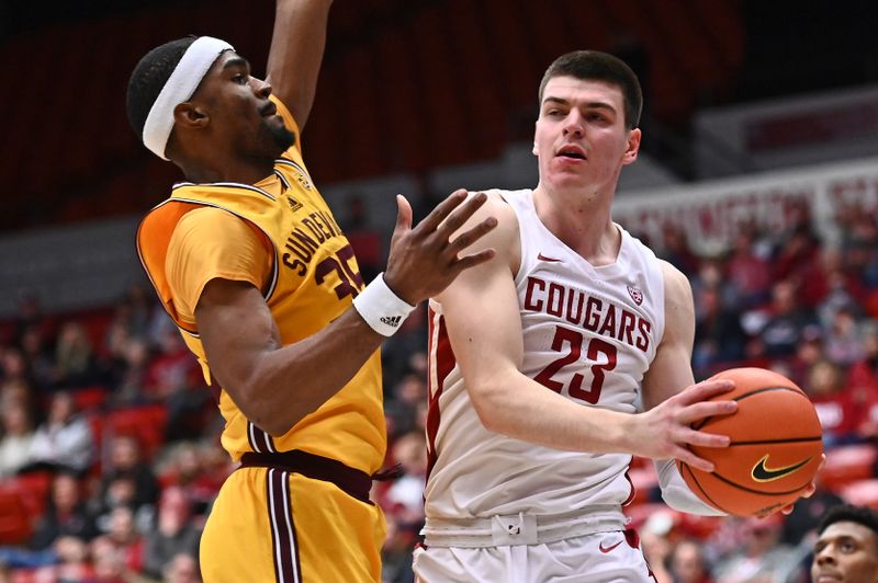 Jan 28, 2023; Pullman, Washington, USA; Washington State Cougars forward Andrej Jakimovski (23) shoots the ball against Arizona State Sun Devils guard Devan Cambridge (35) in the second half at Friel Court at Beasley Coliseum. Washington State won 75-58. Mandatory Credit: James Snook-USA TODAY Sports