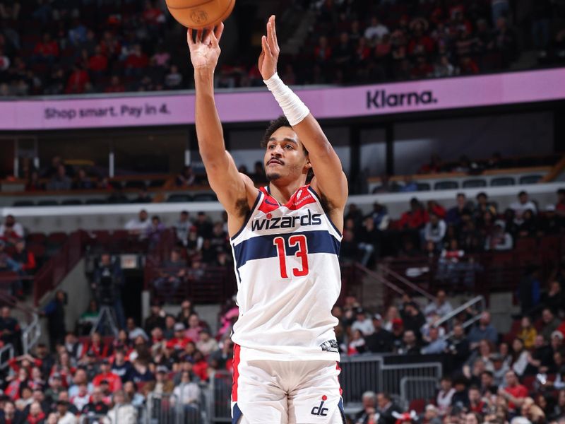 CHICAGO, IL - MARCH 25:  Jordan Poole #13 of the Washington Wizards shoots a three point basket during the game against the Chicago Bulls on March 25, 2024 at United Center in Chicago, Illinois. NOTE TO USER: User expressly acknowledges and agrees that, by downloading and or using this photograph, User is consenting to the terms and conditions of the Getty Images License Agreement. Mandatory Copyright Notice: Copyright 2024 NBAE (Photo by Jeff Haynes/NBAE via Getty Images)