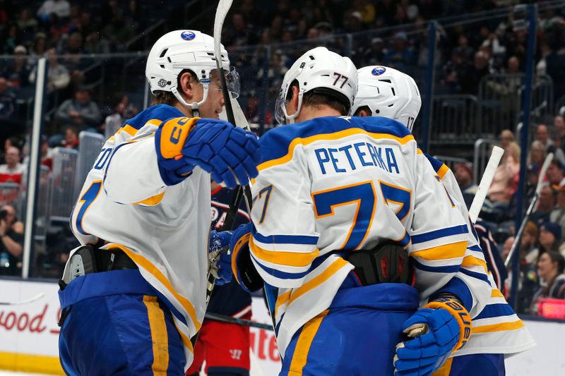 Oct 17, 2024; Columbus, Ohio, USA;  Buffalo Sabres right wing John-Jason Peterka (77) celebrates his goal against the Columbus Blue Jackets during the third period at Nationwide Arena. Mandatory Credit: Russell LaBounty-Imagn Images