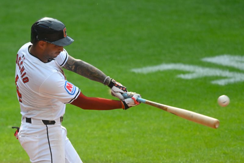 Jun 22, 2024; Cleveland, Ohio, USA; Cleveland Guardians shortstop Brayan Rocchio (4) hits a double in the sixth inning against the Toronto Blue Jays at Progressive Field. Mandatory Credit: David Richard-USA TODAY Sports