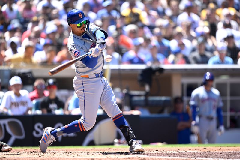 Aug 25, 2024; San Diego, California, USA; New York Mets third baseman Mark Vientos (27) hits a single against the San Diego Padres during the third inning at Petco Park. Mandatory Credit: Orlando Ramirez-USA TODAY Sports