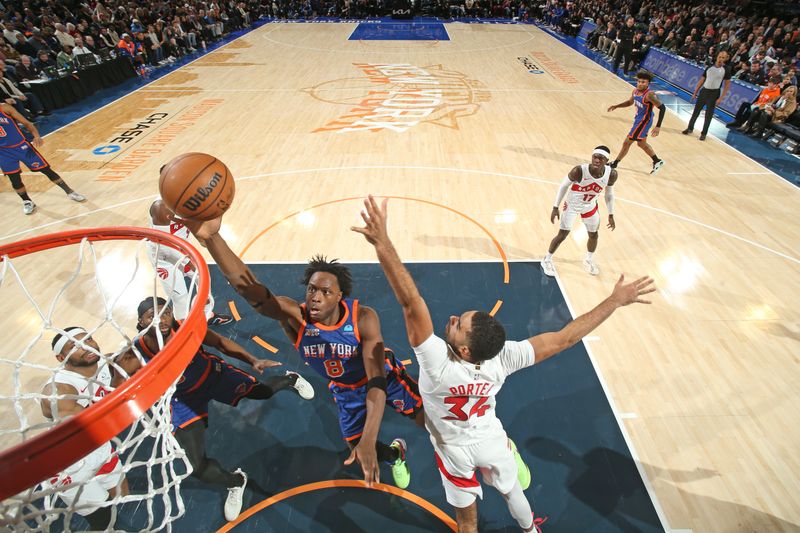 NEW YORK, NY - JANUARY 20: OG Anunoby #8 of the New York Knicks drives to the basket during the game against the Toronto Raptors on January 20, 2024 at Madison Square Garden in New York City, New York.  NOTE TO USER: User expressly acknowledges and agrees that, by downloading and or using this photograph, User is consenting to the terms and conditions of the Getty Images License Agreement. Mandatory Copyright Notice: Copyright 2024 NBAE  (Photo by Nathaniel S. Butler/NBAE via Getty Images)