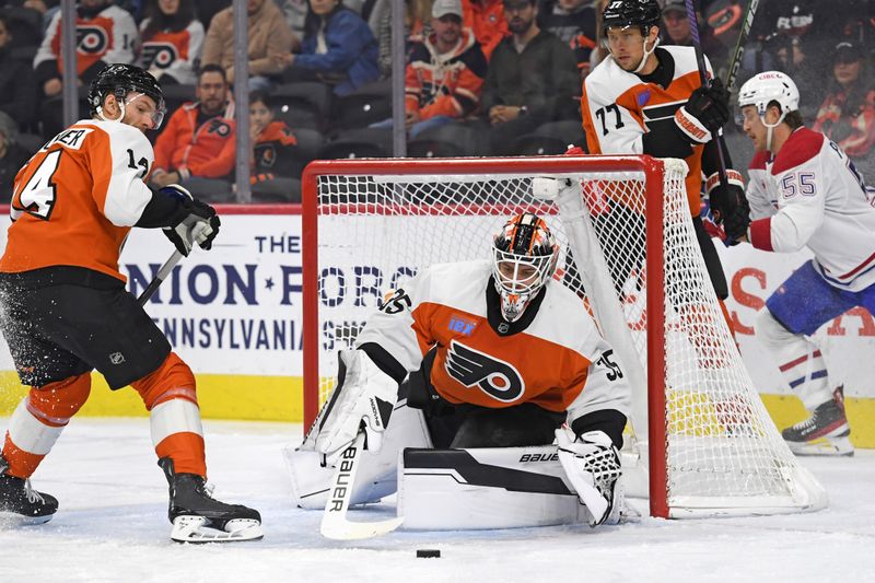 Oct 27, 2024; Philadelphia, Pennsylvania, USA; Philadelphia Flyers goaltender Aleksei Kosolov (35) makes a save against the Montreal Canadiens during the first period at Wells Fargo Center. Mandatory Credit: Eric Hartline-Imagn Images