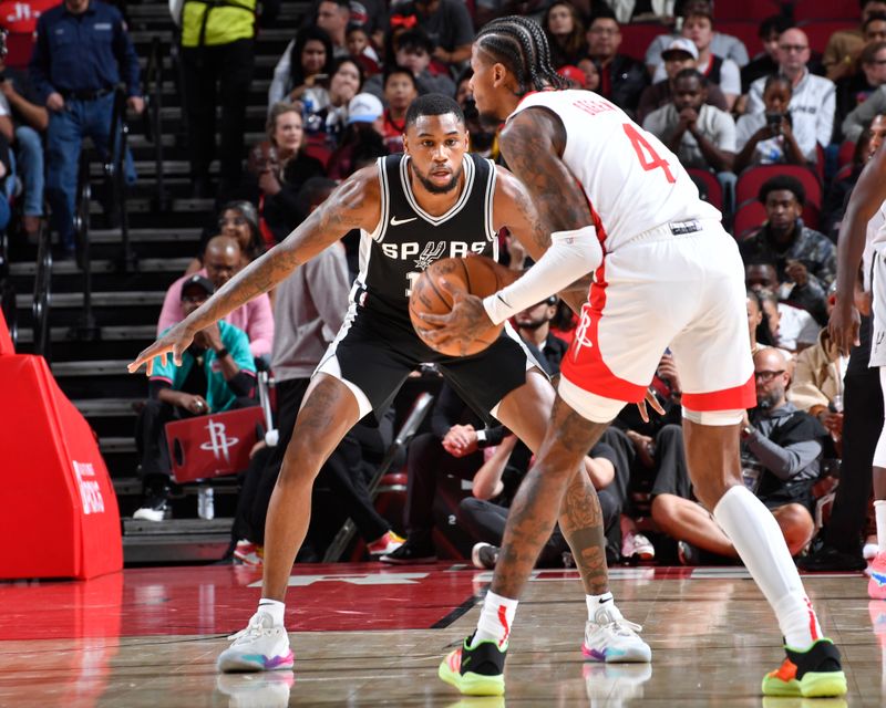 HOUSTON, TX - OCTOBER 17: Blake Wesley #14 of the San Antonio Spurs plays defense during the game against the Houston Rockets on October 17, 2024 at the Toyota Center in Houston, Texas. NOTE TO USER: User expressly acknowledges and agrees that, by downloading and or using this photograph, User is consenting to the terms and conditions of the Getty Images License Agreement. Mandatory Copyright Notice: Copyright 2024 NBAE (Photo by Logan Riely/NBAE via Getty Images)