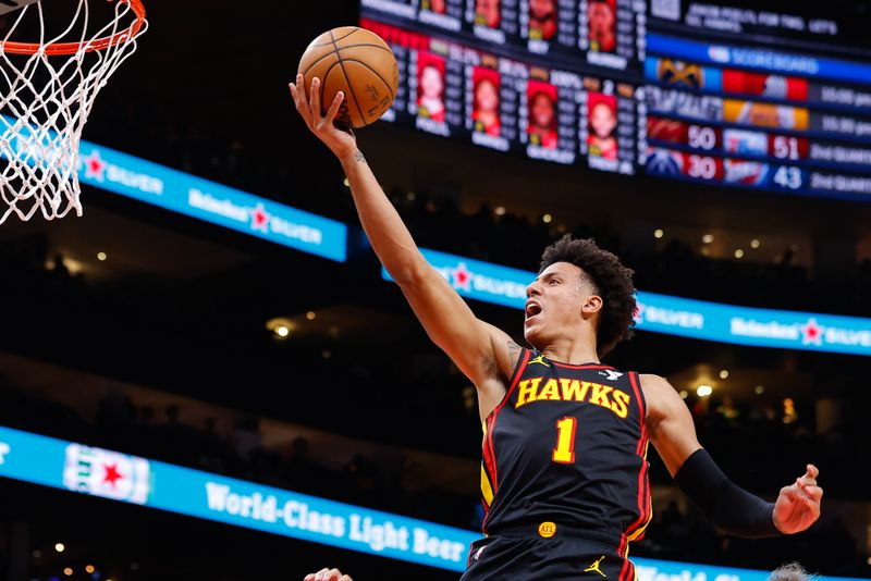 ATLANTA, GEORGIA - FEBRUARY 23: Jalen Johnson #1 of the Atlanta Hawks goes up for a shot during the second quarter against the Toronto Raptors at State Farm Arena on February 23, 2024 in Atlanta, Georgia. NOTE TO USER: User expressly acknowledges and agrees that, by downloading and or using this photograph, User is consenting to the terms and conditions of the Getty Images License Agreement. (Photo by Todd Kirkland/Getty Images)