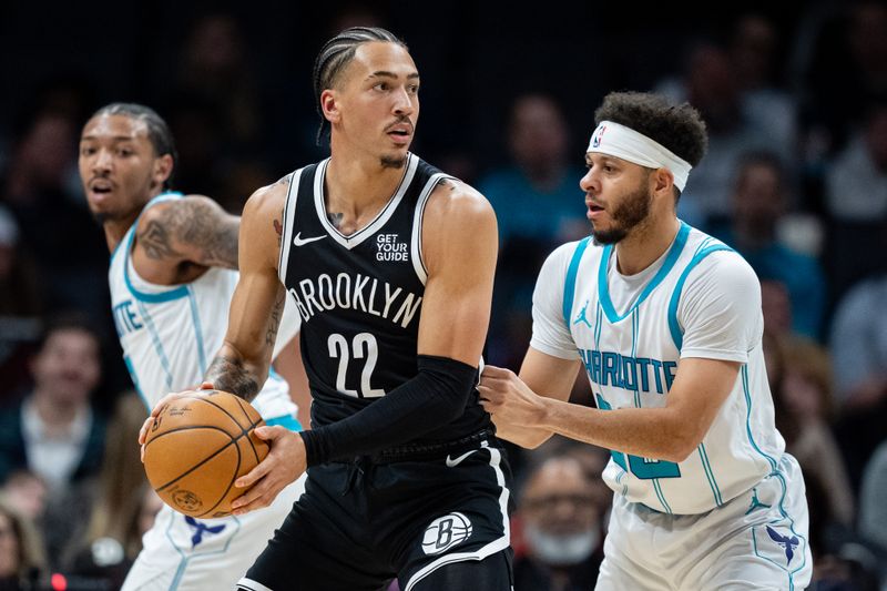 CHARLOTTE, NORTH CAROLINA - JANUARY 29: Seth Curry #30 of the Charlotte Hornets guards Jalen Wilson #22 of the Brooklyn Nets in the first quarter at Spectrum Center on January 29, 2025 in Charlotte, North Carolina. NOTE TO USER: User expressly acknowledges and agrees that, by downloading and or using this photograph, User is consenting to the terms and conditions of the Getty Images License Agreement. (Photo by Jacob Kupferman/Getty Images)