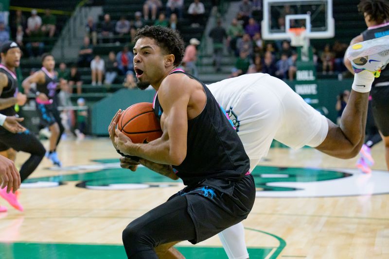 Jan 11, 2024; New Orleans, Louisiana, USA;  Florida Atlantic Owls guard Nicholas Boyd (2) reacts after making a rebound against the Tulane Green Wave during the first half at Avron B. Fogelman Arena in Devlin Fieldhouse. Mandatory Credit: Matthew Hinton-USA TODAY Sports