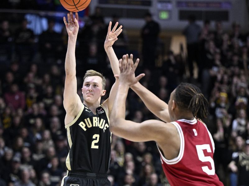 Feb 25, 2023; West Lafayette, Indiana, USA; Purdue Boilermakers guard Fletcher Loyer (2) shoots the ball against Indiana Hoosiers forward Malik Reneau (5) during the second half at Mackey Arena. Indiana won 79-71. Mandatory Credit: Marc Lebryk-USA TODAY Sports