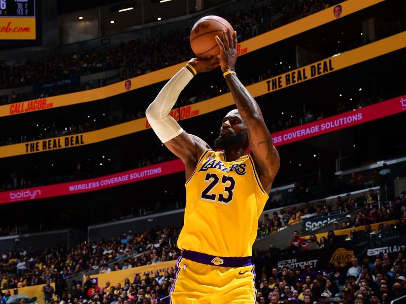LOS ANGELES, CA - MARCH 4: LeBron James #23 of the Los Angeles Lakers shoots a three point basket during the game against the New Orleans Pelicans on March 4, 2025 at Crypto.Com Arena in Los Angeles, California. NOTE TO USER: User expressly acknowledges and agrees that, by downloading and/or using this Photograph, user is consenting to the terms and conditions of the Getty Images License Agreement. Mandatory Copyright Notice: Copyright 2025 NBAE (Photo by Adam Pantozzi/NBAE via Getty Images)