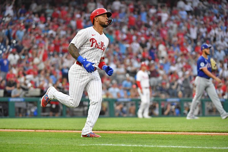 May 22, 2024; Philadelphia, Pennsylvania, USA; Philadelphia Phillies shortstop Edmundo Sosa (33) watches his three run home run against Texas Rangers pitcher Jonathan Hernández (72) during the fourth inning at Citizens Bank Park. Mandatory Credit: Eric Hartline-USA TODAY Sports