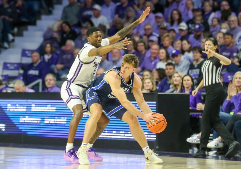 Feb 24, 2024; Manhattan, Kansas, USA; Brigham Young Cougars guard Dallin Hall (30) is guarded by Kansas State Wildcats guard Cam Carter (5) during the first half at Bramlage Coliseum. Mandatory Credit: Scott Sewell-USA TODAY Sports