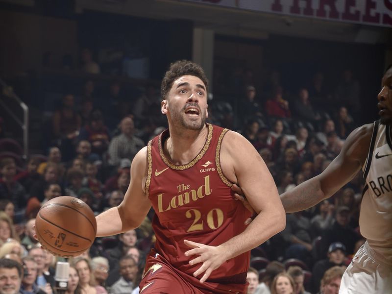 CLEVELAND, OH - MARCH 10: Georges Niang #20 of the Cleveland Cavaliers drives to the basket during the game against the Brooklyn Nets on March 10, 2024 at Rocket Mortgage FieldHouse in Cleveland, Ohio. NOTE TO USER: User expressly acknowledges and agrees that, by downloading and/or using this Photograph, user is consenting to the terms and conditions of the Getty Images License Agreement. Mandatory Copyright Notice: Copyright 2024 NBAE (Photo by David Liam Kyle/NBAE via Getty Images)