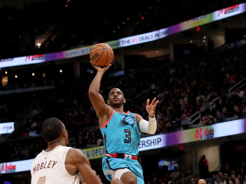 CLEVELAND, OH - JANUARY 4: Chris Paul #3 of the Phoenix Suns drives to the basket against the Cleveland Cavaliers on January 4, 2023 at Rocket Mortgage FieldHouse in Cleveland, Ohio. NOTE TO USER: User expressly acknowledges and agrees that, by downloading and/or using this Photograph, user is consenting to the terms and conditions of the Getty Images License Agreement. Mandatory Copyright Notice: Copyright 2022 NBAE (Photo by Lauren Bacho/NBAE via Getty Images)