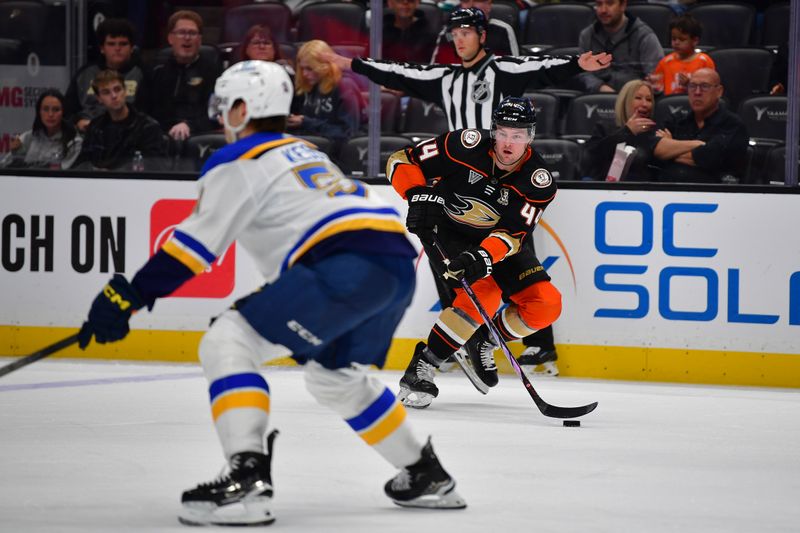 Apr 7, 2024; Anaheim, California, USA; Anaheim Ducks left wing Ross Johnston (44) moves the puck against the St. Louis Blues during the second period at Honda Center. Mandatory Credit: Gary A. Vasquez-USA TODAY Sports