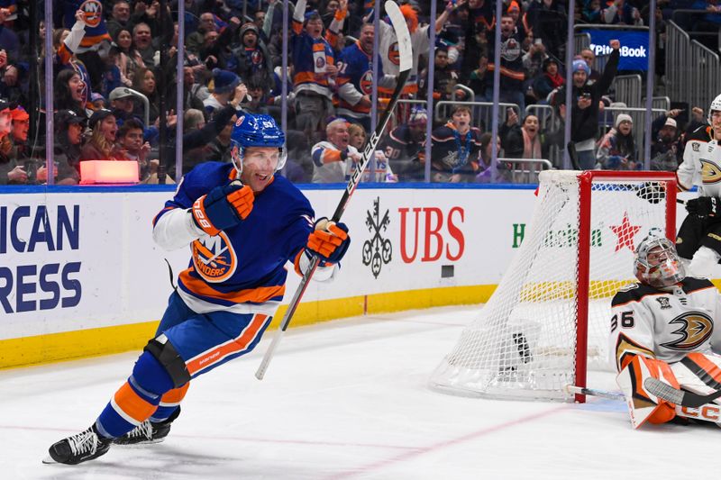 Dec 13, 2023; Elmont, New York, USA; New York Islanders center Casey Cizikas (53) celebrates his goal against the Anaheim Ducks during the second period at UBS Arena. Mandatory Credit: Dennis Schneidler-USA TODAY Sports