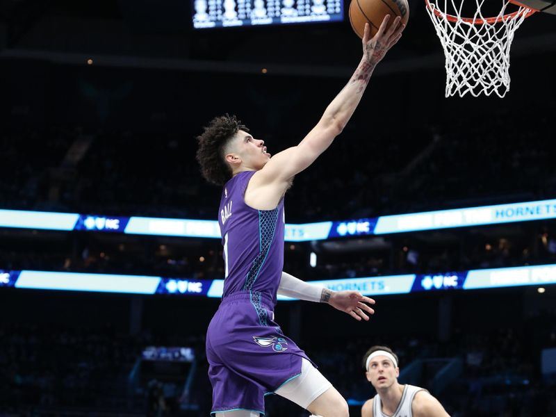 CHARLOTTE, NC - JANUARY 19: LaMelo Ball #1 of the Charlotte Hornets drives to the basket during the game against the San Antonio Spurs on January 19, 2024 at Spectrum Center in Charlotte, North Carolina. NOTE TO USER: User expressly acknowledges and agrees that, by downloading and or using this photograph, User is consenting to the terms and conditions of the Getty Images License Agreement.  Mandatory Copyright Notice:  Copyright 2024 NBAE (Photo by Brock Williams-Smith/NBAE via Getty Images)