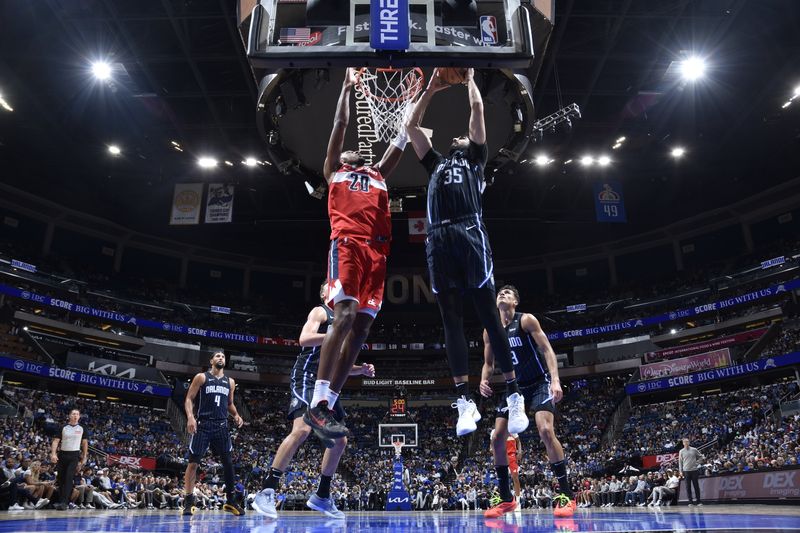 ORLANDO, FL - NOVMEBER 10: Goga Bitadze #35 of the Orlando Magic dunks the ball during the game against the Washington Wizards on November 10, 2024 at Kia Center in Orlando, Florida. NOTE TO USER: User expressly acknowledges and agrees that, by downloading and or using this photograph, User is consenting to the terms and conditions of the Getty Images License Agreement. Mandatory Copyright Notice: Copyright 2024 NBAE (Photo by Fernando Medina/NBAE via Getty Images)