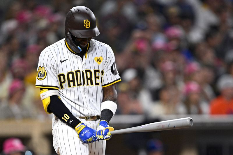 Aug 22, 2024; San Diego, California, USA; San Diego Padres left fielder Jurickson Profar (10) reacts after a walk against the New York Mets during the fifth inning at Petco Park. Mandatory Credit: Orlando Ramirez-USA TODAY Sports