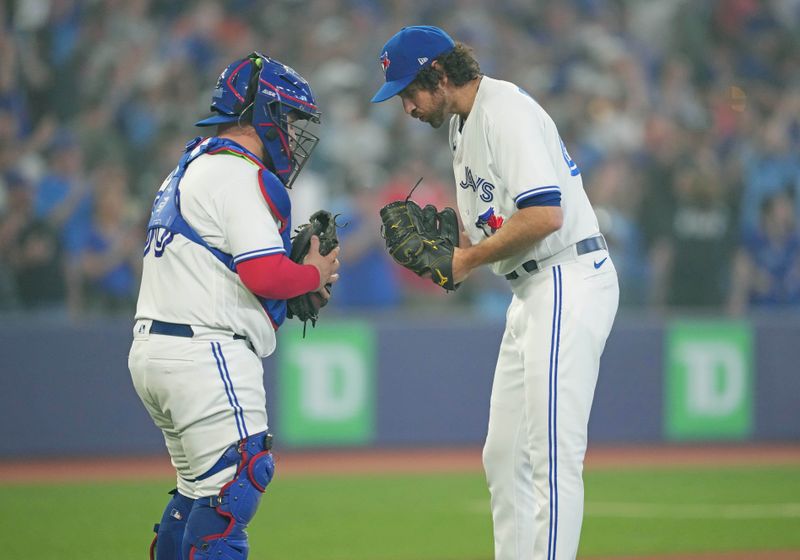 Jun 29, 2023; Toronto, Ontario, CAN; Toronto Blue Jays relief pitcher Jordan Romano (68) celebrates the win with Toronto Blue Jays catcher Alejandro Kirk (30) against the San Francisco Giants at the end of the ninth inning at Rogers Centre. Mandatory Credit: Nick Turchiaro-USA TODAY Sports