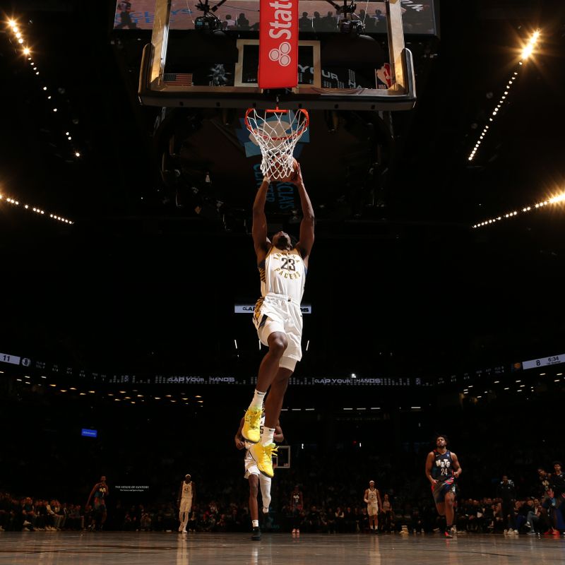 BROOKLYN, NY - APRIL 3: Aaron Nesmith #23 of the Indiana Pacers dunks the ball during the game against the Brooklyn Nets on April 3, 2024 at Barclays Center in Brooklyn, New York. NOTE TO USER: User expressly acknowledges and agrees that, by downloading and or using this Photograph, user is consenting to the terms and conditions of the Getty Images License Agreement. Mandatory Copyright Notice: Copyright 2024 NBAE (Photo by Nathaniel S. Butler/NBAE via Getty Images)