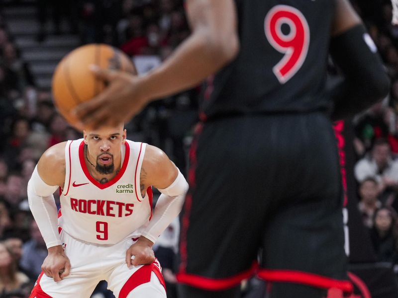 TORONTO, ON - FEBRUARY 9: Dillon Brooks #9 of the Houston Rockets guards RJ Barrett #9 of the Toronto Raptors during the second half of their basketball game at the Scotiabank Arena on February 9, 2024 in Toronto, Ontario, Canada. NOTE TO USER: User expressly acknowledges and agrees that, by downloading and/or using this Photograph, user is consenting to the terms and conditions of the Getty Images License Agreement. (Photo by Mark Blinch/Getty Images)