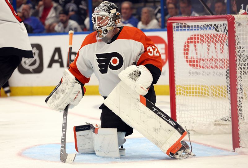 Mar 9, 2024; Tampa, Florida, USA; Philadelphia Flyers goaltender Felix Sandstrom (32) against the Tampa Bay Lightning during the third period at Amalie Arena. Mandatory Credit: Kim Klement Neitzel-USA TODAY Sports