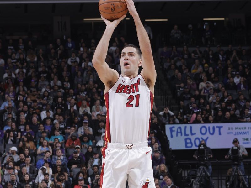 SACRAMENTO, CA - FEBRUARY 26: Cole Swider #21 of the Miami Heat shoots the ball during the game against the Sacramento Kings on February 26, 2024 at Golden 1 Center in Sacramento, California. NOTE TO USER: User expressly acknowledges and agrees that, by downloading and or using this Photograph, user is consenting to the terms and conditions of the Getty Images License Agreement. Mandatory Copyright Notice: Copyright 2024 NBAE (Photo by Rocky Widner/NBAE via Getty Images)