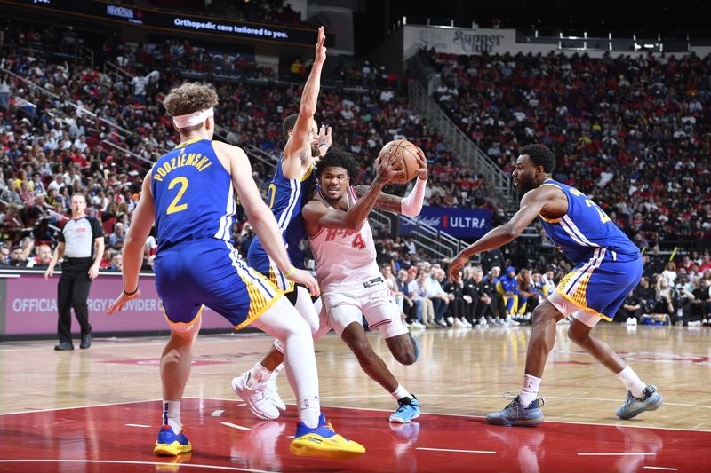 HOUSTON, TX - APRIL 4: Jalen Green #4 of the Houston Rockets drives to the basket during the game against the Golden State Warriors on April 4, 2024 at the Toyota Center in Houston, Texas. NOTE TO USER: User expressly acknowledges and agrees that, by downloading and or using this photograph, User is consenting to the terms and conditions of the Getty Images License Agreement. Mandatory Copyright Notice: Copyright 2024 NBAE (Photo by Logan Riely/NBAE via Getty Images)