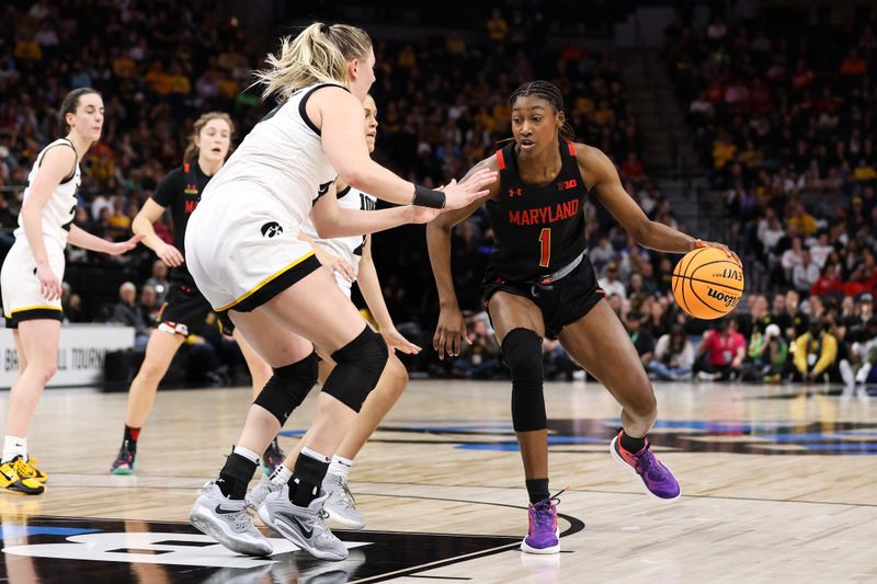 Mar 4, 2023; Minneapolis, MINN, USA; Maryland Terrapins guard Diamond Miller (1) drives to the basket while Iowa Hawkeyes forward Monika Czinano (25) defends during the second half at Target Center. Mandatory Credit: Matt Krohn-USA TODAY Sports