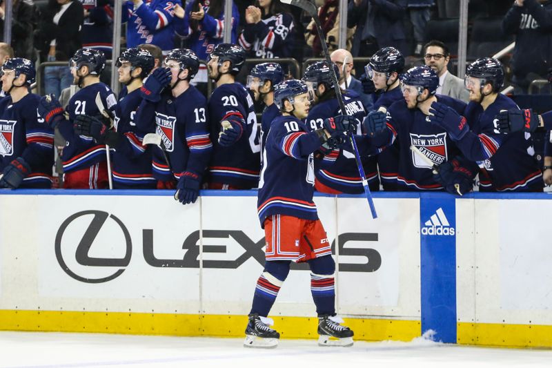 Mar 23, 2024; New York, New York, USA; New York Rangers left wing Artemi Panarin (10) celebrates with his teammates after scoring the eventual game winning goal during a shootout in overtime against the Florida Panthers at Madison Square Garden. Mandatory Credit: Wendell Cruz-USA TODAY Sports