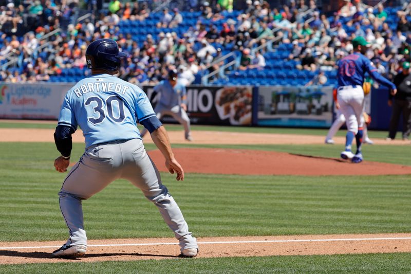Mar 17, 2025; Port St. Lucie, Florida, USA;  Tampa Bay Rays catcher Ben Rortvedt (30) leads off from third base during the fourth inning against the New York Mets at Clover Park. Mandatory Credit: Reinhold Matay-Imagn Images. 